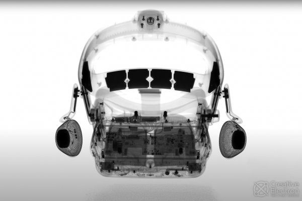 X-ray image of a Valve Index VR headset showing internals like the speakers, counterweights, and motherboard, created by Creative Electron.